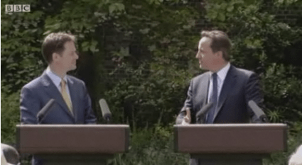 Prime Minister David Cameron and Deputy Prime Minister Nick Clegg seal their relationship in public as this still from the BBC News website shows Prime Minister David Cameron and Deputy Prime Minister Nick Clegg seal their relationship in public as this still from the BBC News website shows