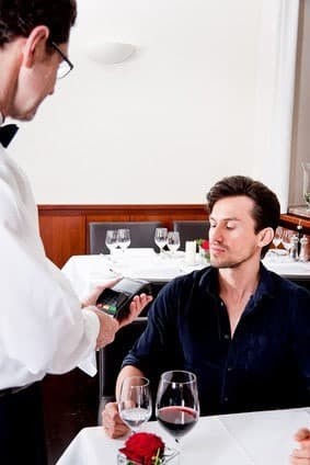 Paying a bill in a restaurant