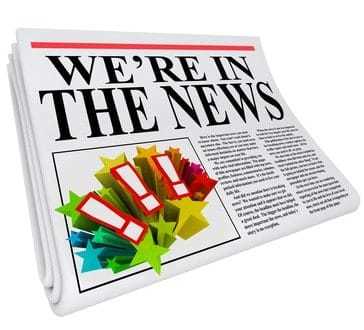 A 3D newspaper with headline reading We're in the News to show that you have been featured in an article to give you great public relations attention and exposure