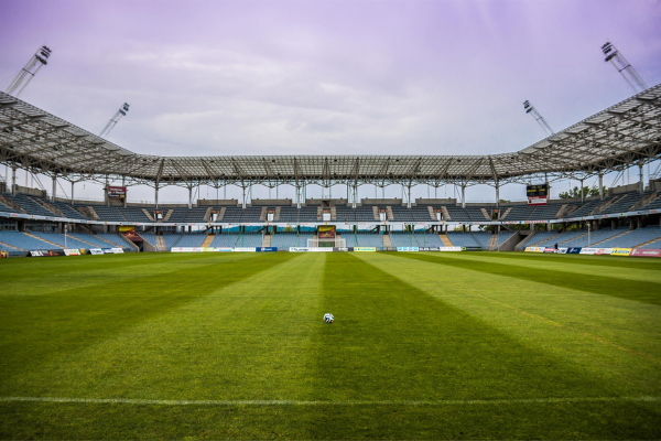 Empty football stadium with no supporters